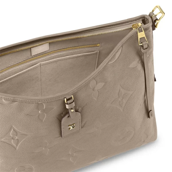 CarryAll MM Bag Monogram Empreinte leer in handtassen voor dames Alle collecties